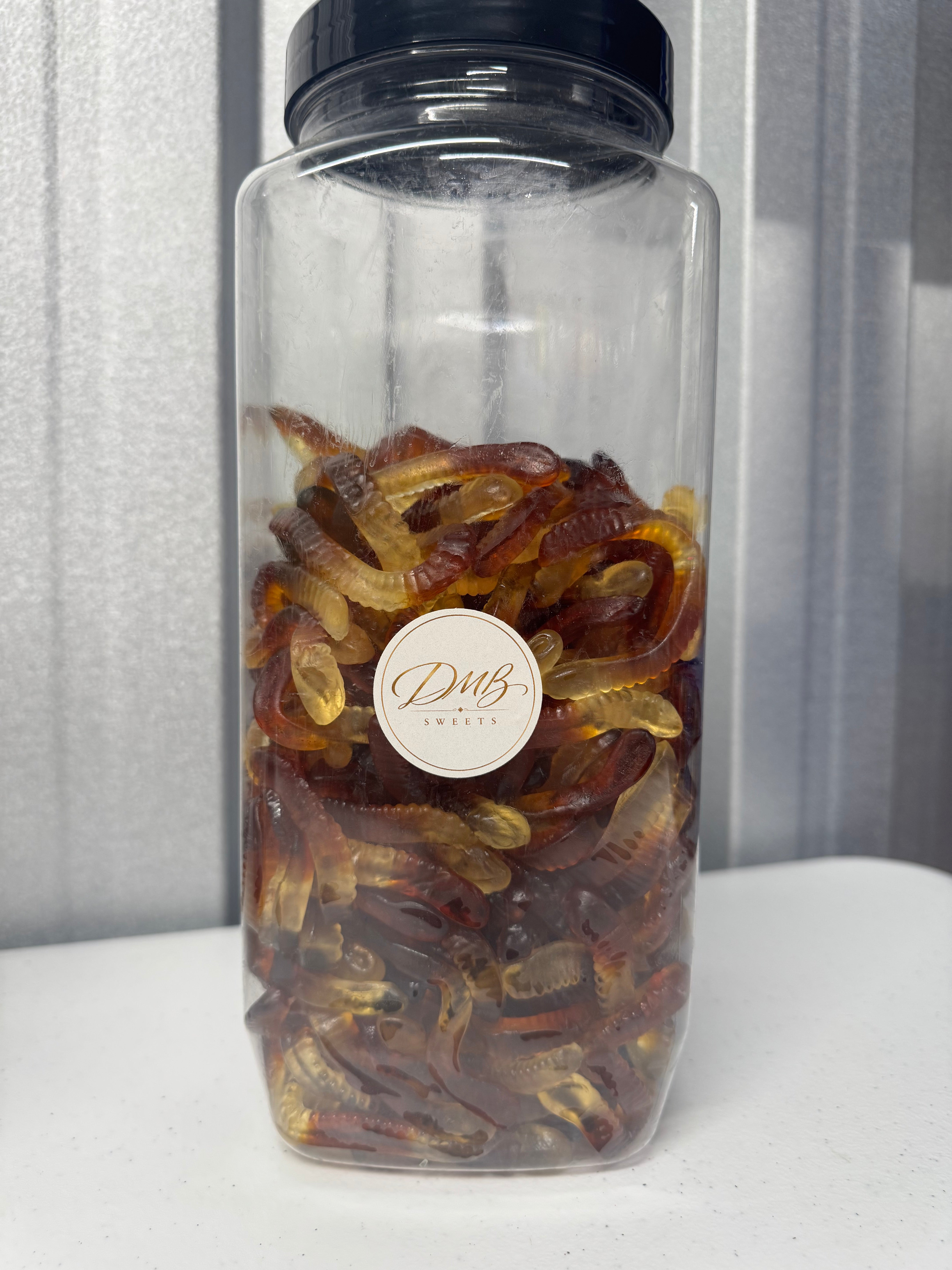 Cola Worms gummy sweets in a DMB Sweets jar