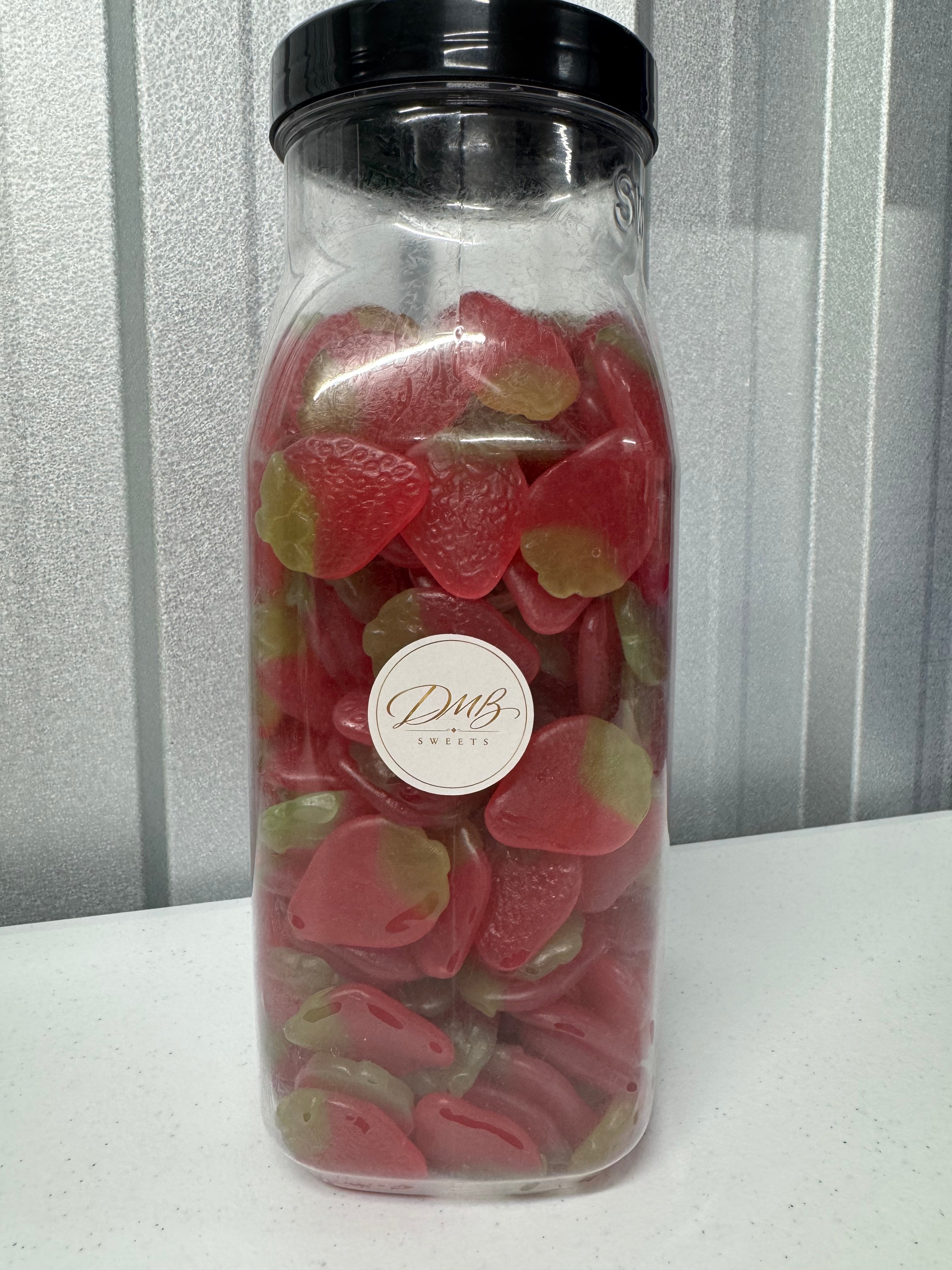 Giant Strawberries gummy sweets in a DMB Sweets jar