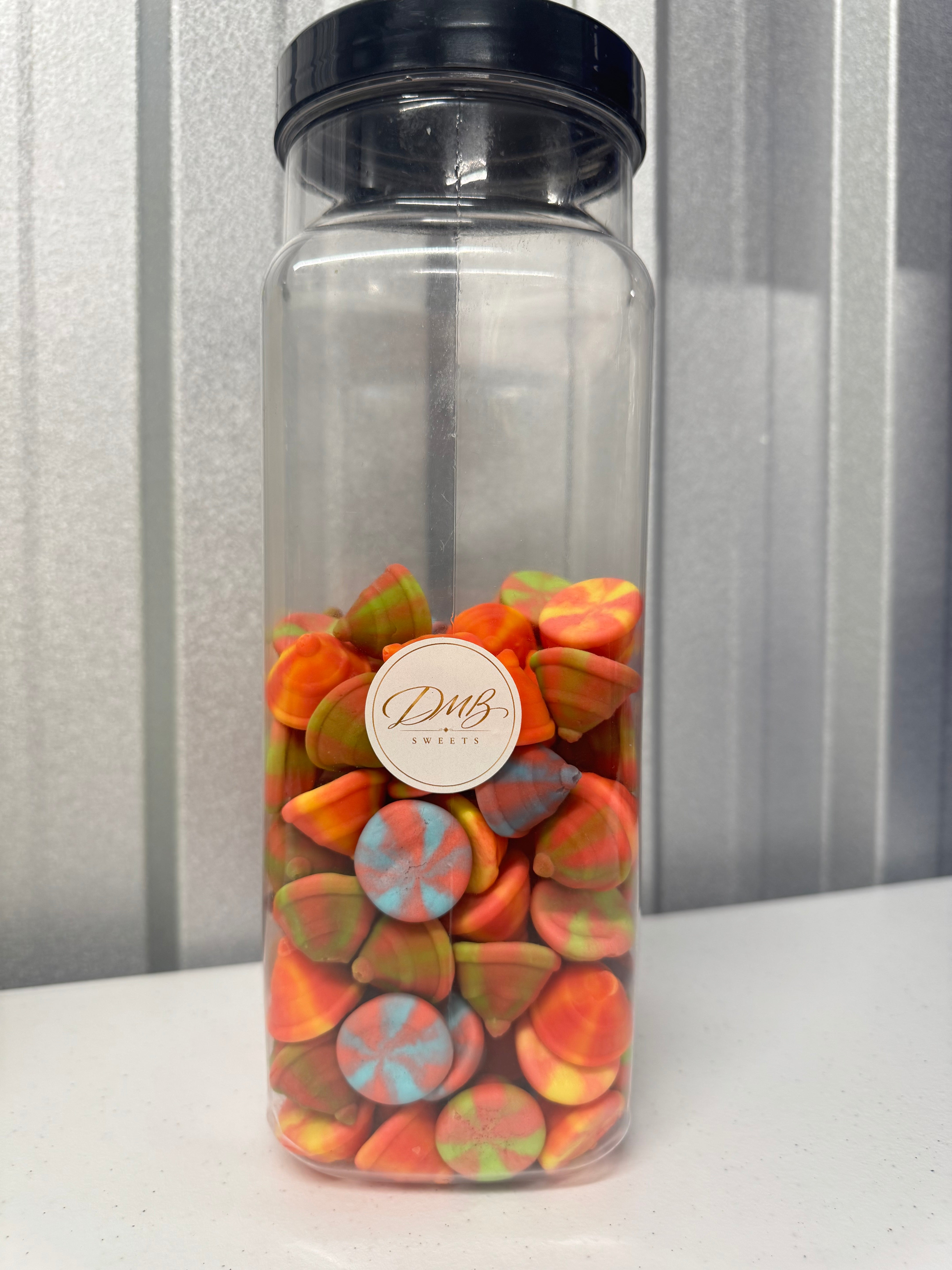 Multicoloured Spinning Tops foam sweets in a DMB Sweets jar