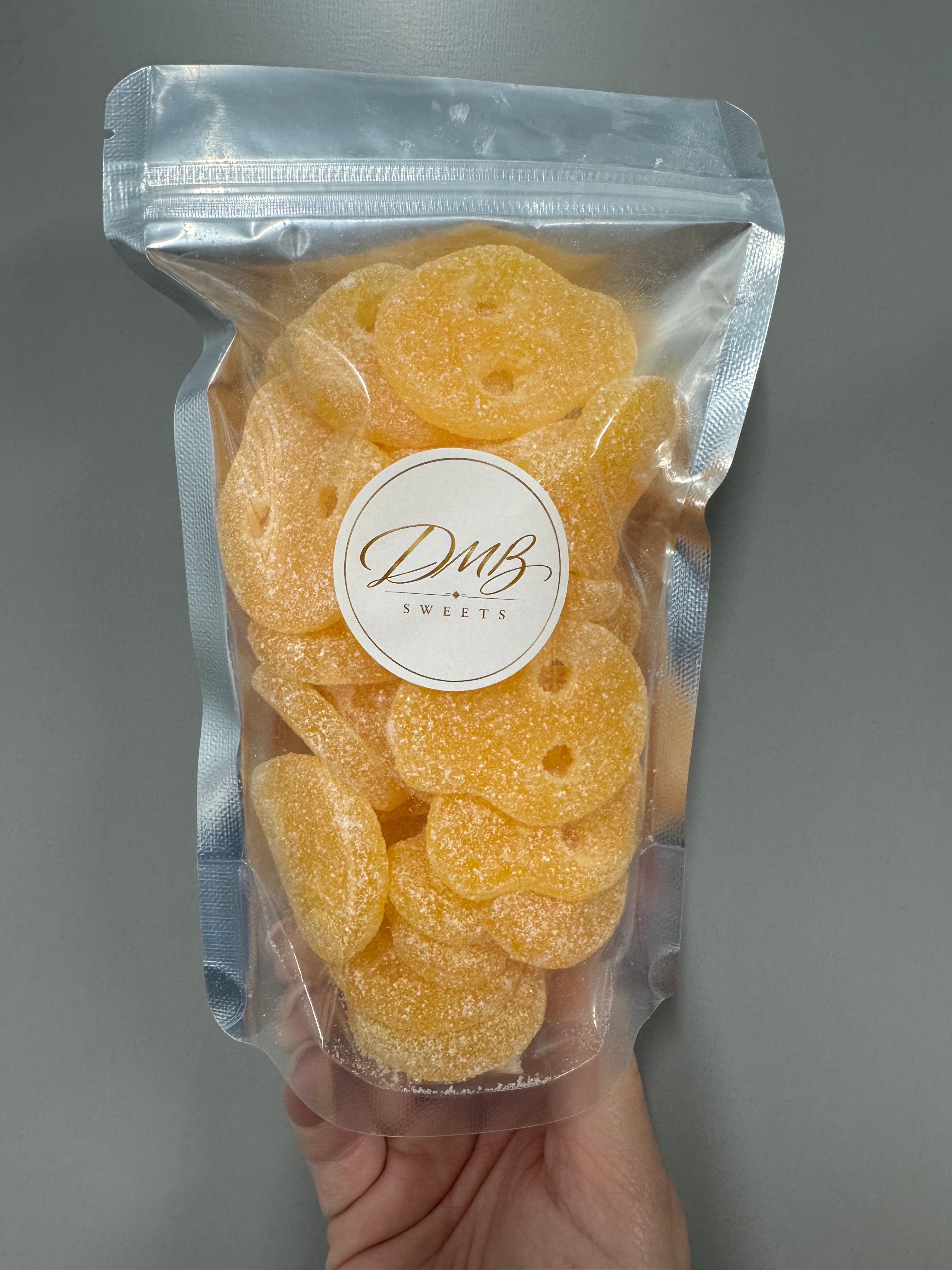 Mango Fizzy Skulls in a DMB Sweets resealable bag